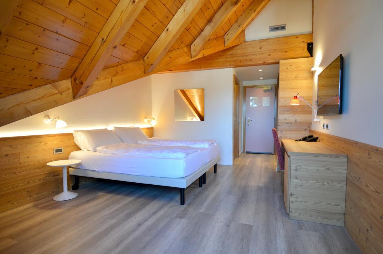 Alpholiday Dolomiti Wellness & Family Hotel Димаро Номер фото