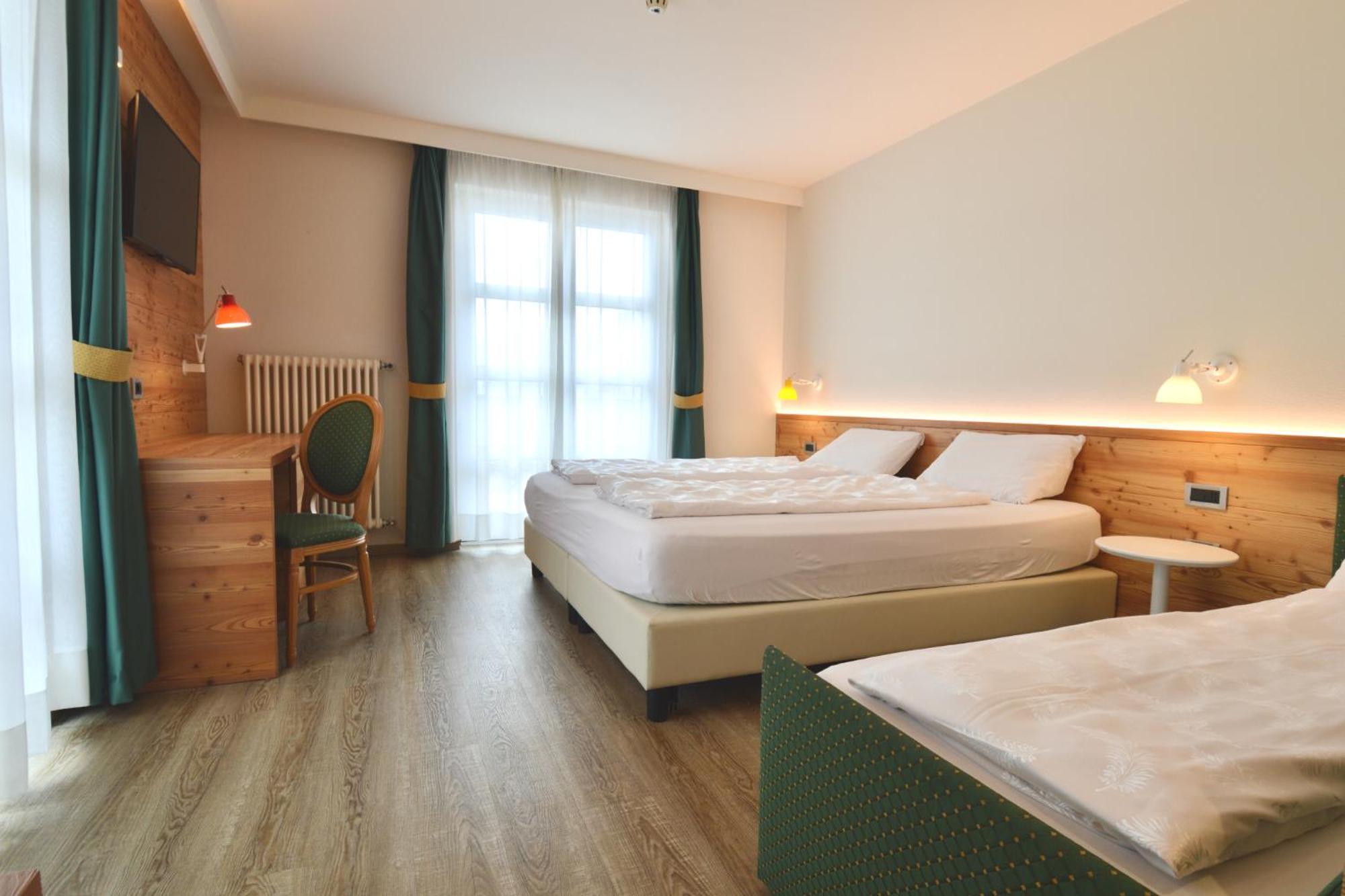 Alpholiday Dolomiti Wellness & Family Hotel Димаро Номер фото