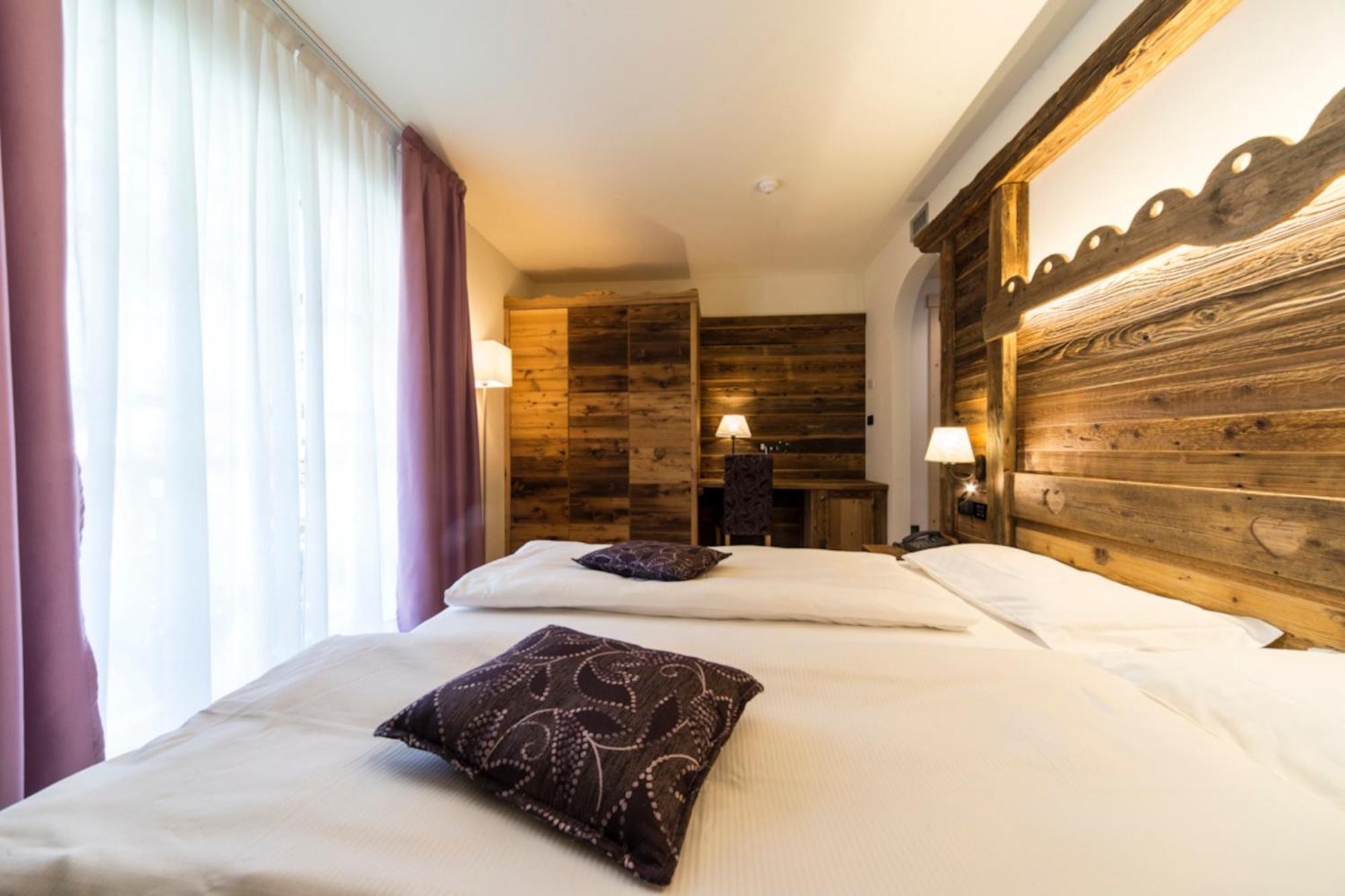 Alpholiday Dolomiti Wellness & Family Hotel Димаро Номер фото