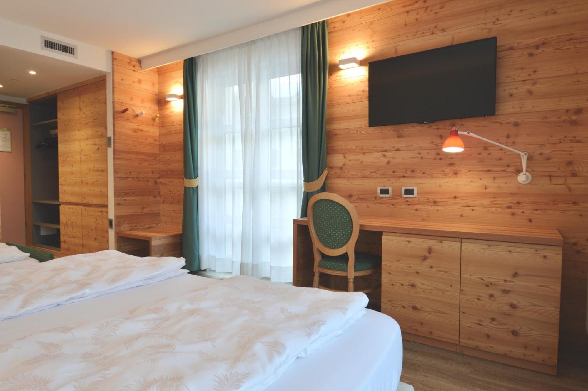 Alpholiday Dolomiti Wellness & Family Hotel Димаро Номер фото
