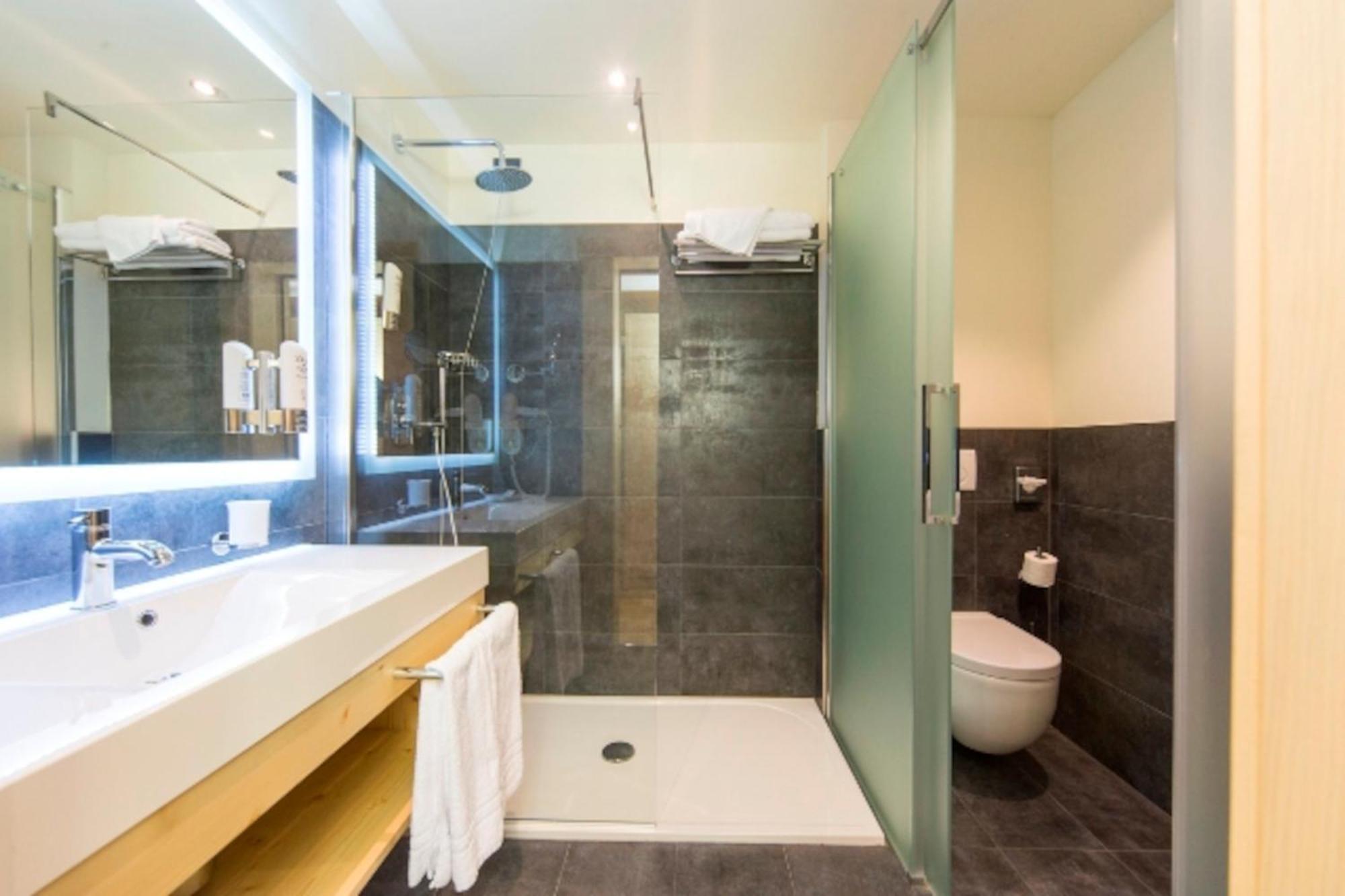 Alpholiday Dolomiti Wellness & Family Hotel Димаро Номер фото