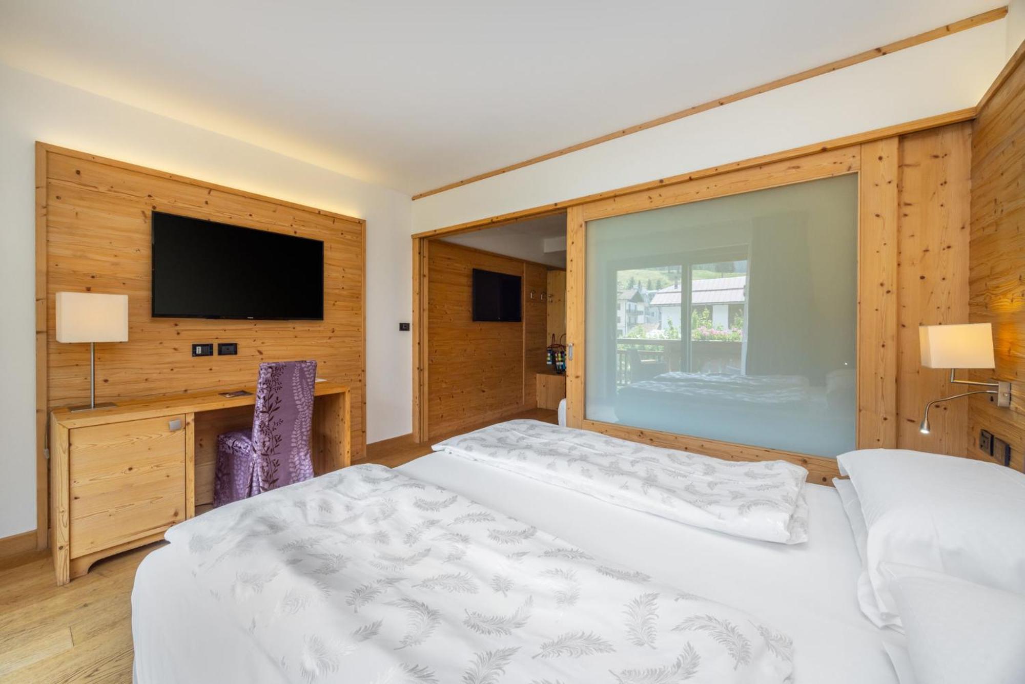 Alpholiday Dolomiti Wellness & Family Hotel Димаро Номер фото