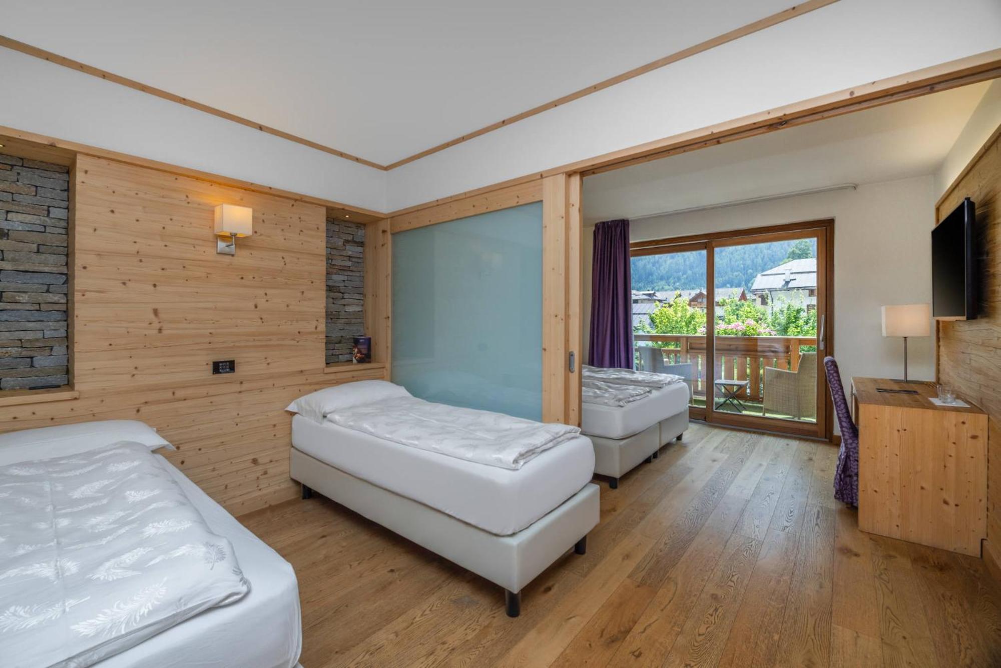 Alpholiday Dolomiti Wellness & Family Hotel Димаро Номер фото