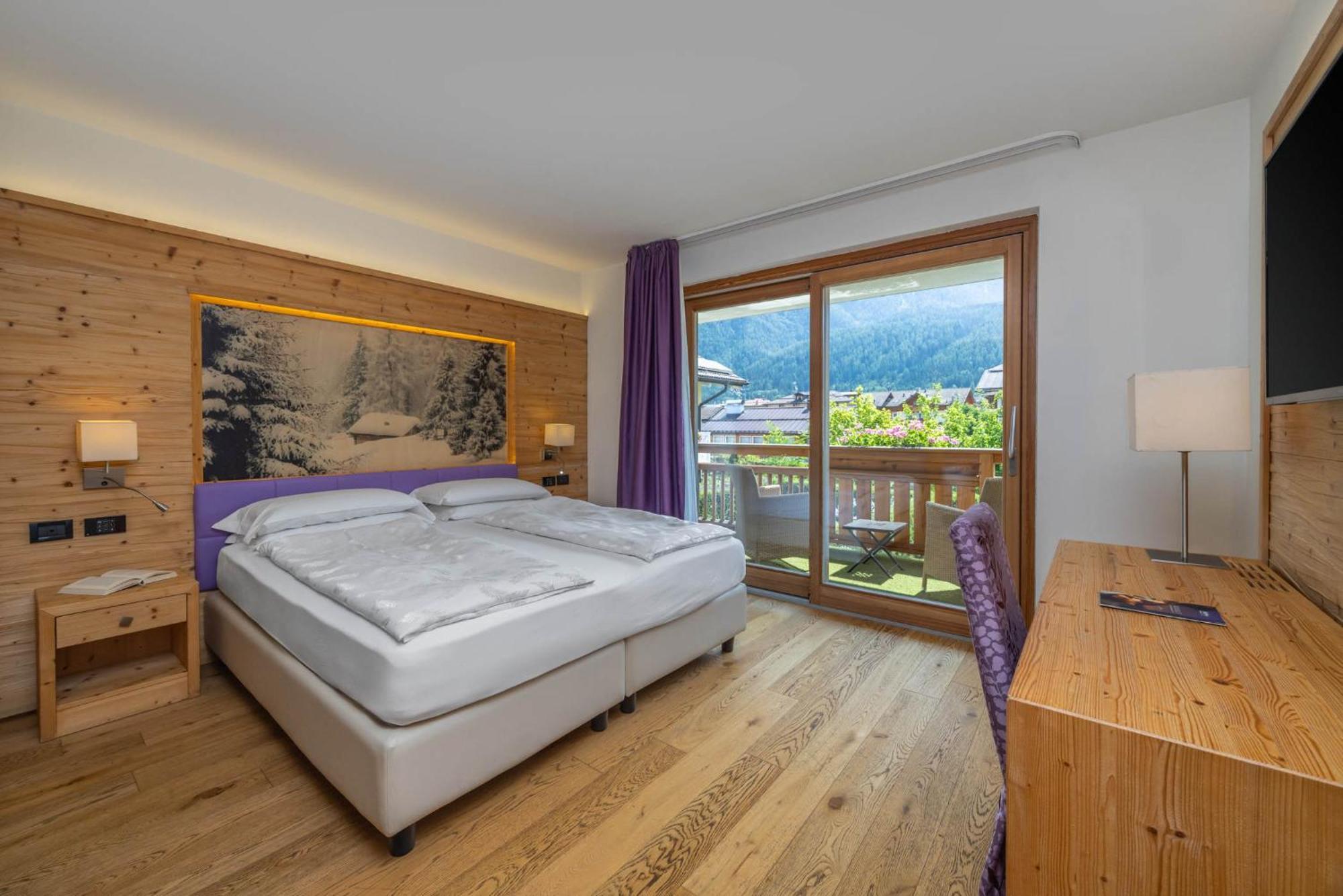Alpholiday Dolomiti Wellness & Family Hotel Димаро Номер фото